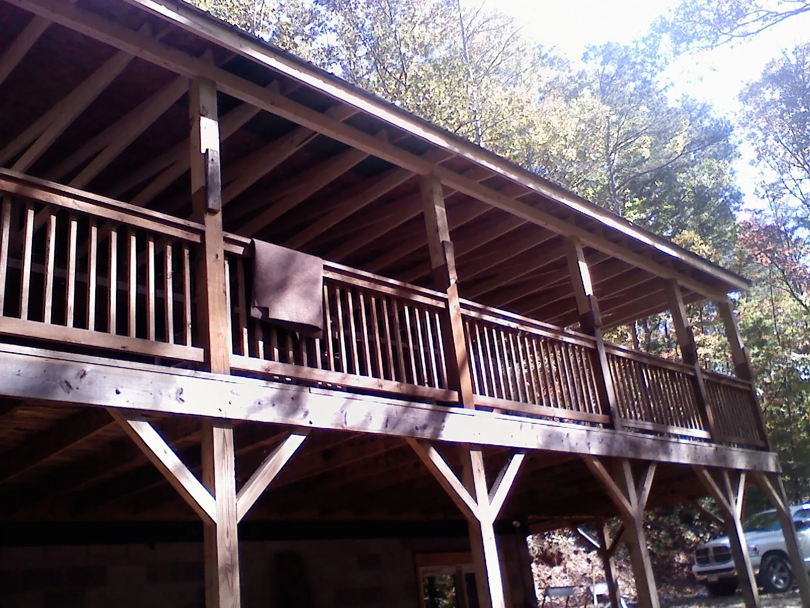Timber framing under a new elevated porch and deck — Roof Leak Repair in Bellaire by Roofing Brothers
